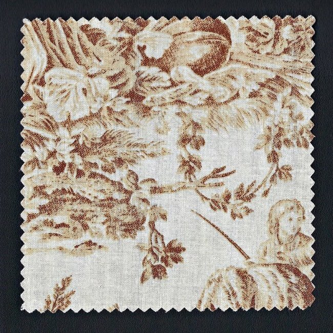 A brown and cream square piece of cloth.