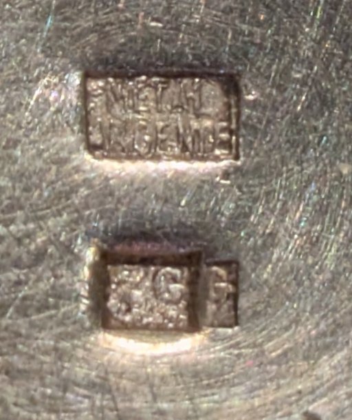 Engraving marks on silver cup